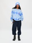 DISTRESSED ARGYLE SWEATER in LIGHT BLUE